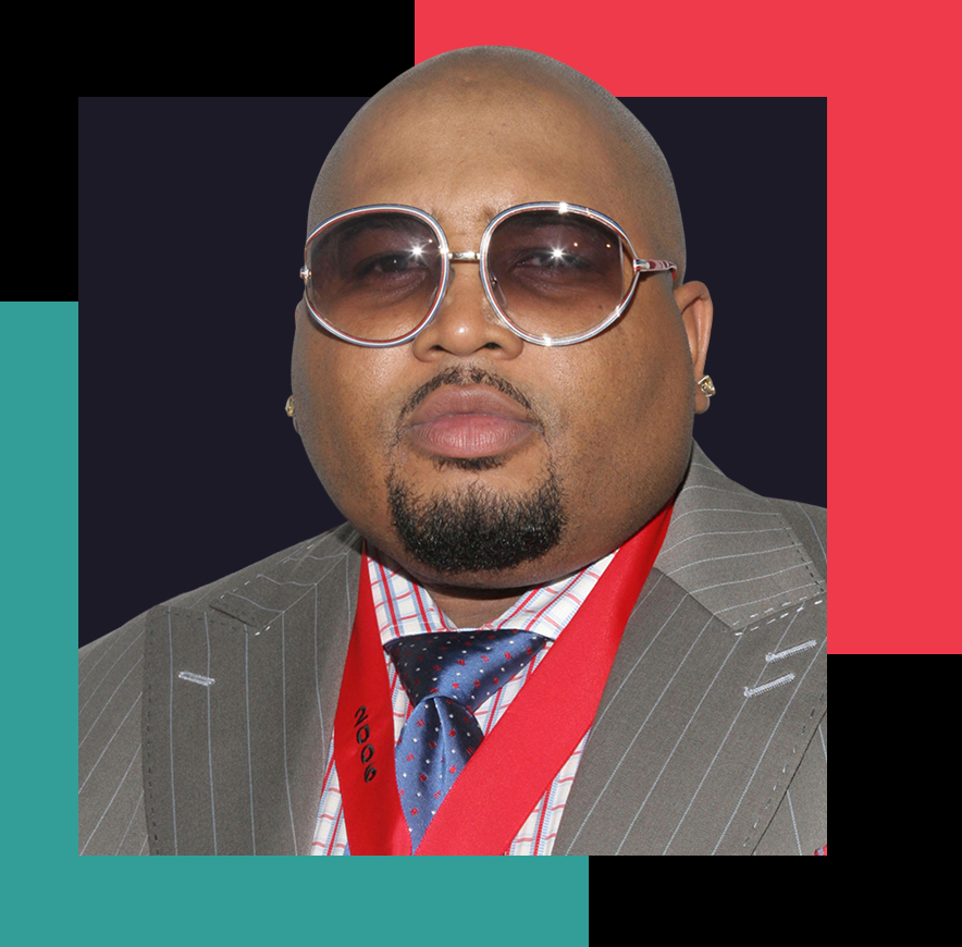 Jazze wears sunglasses and a suit