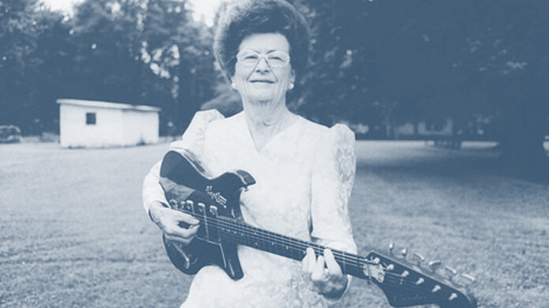 Cordell poses with her guitar