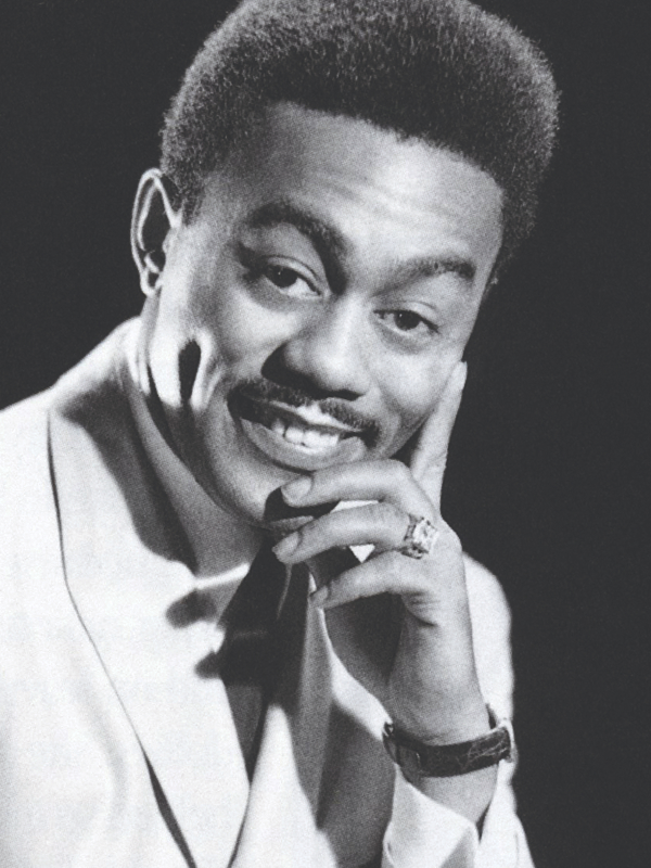 a candid black-and-white portrait of Johnnie Taylor