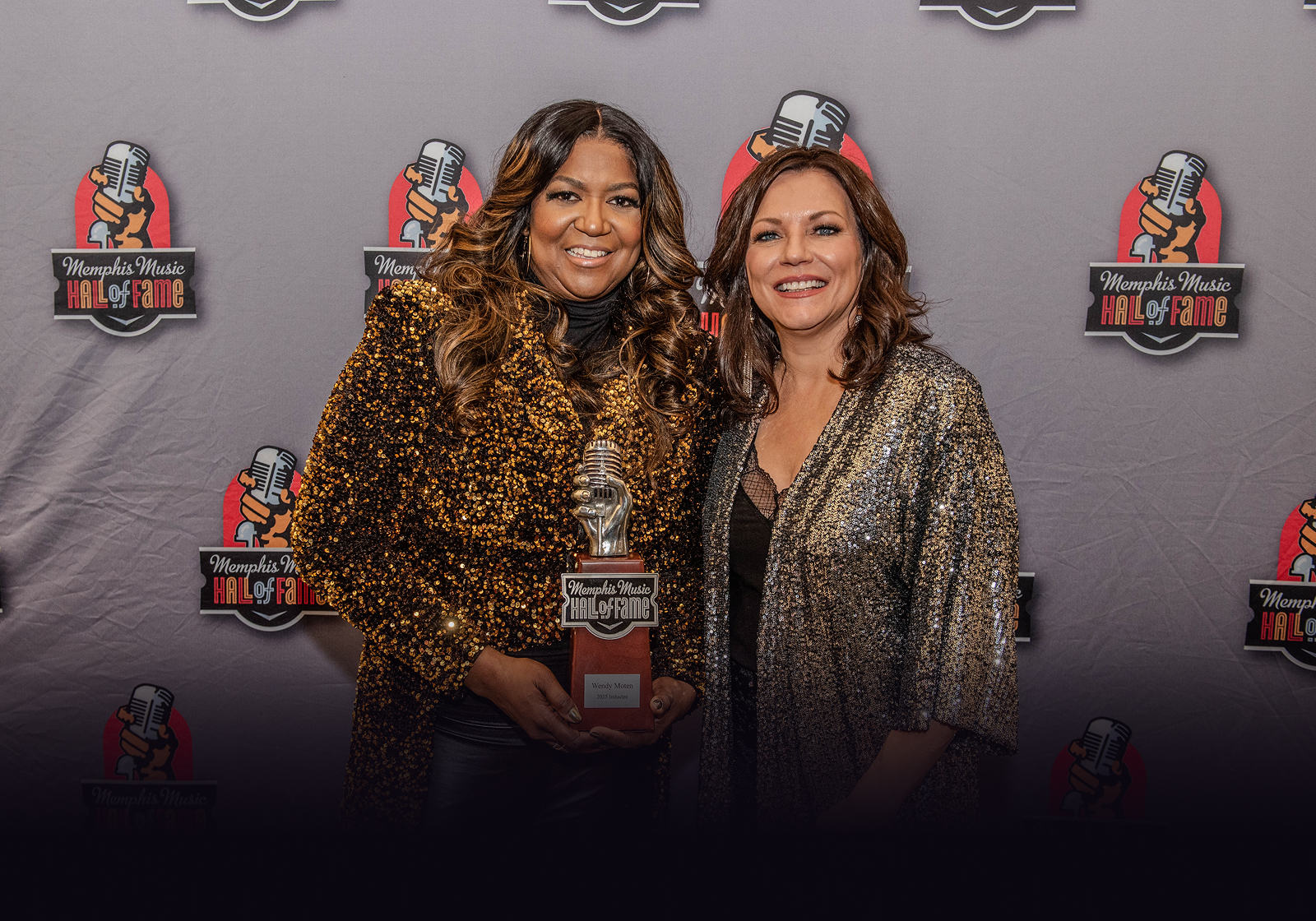 Wendy poses with her MMHOF trophy